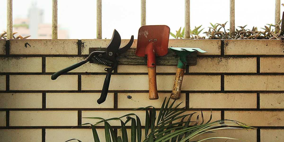 garden tools brick wall.jpg